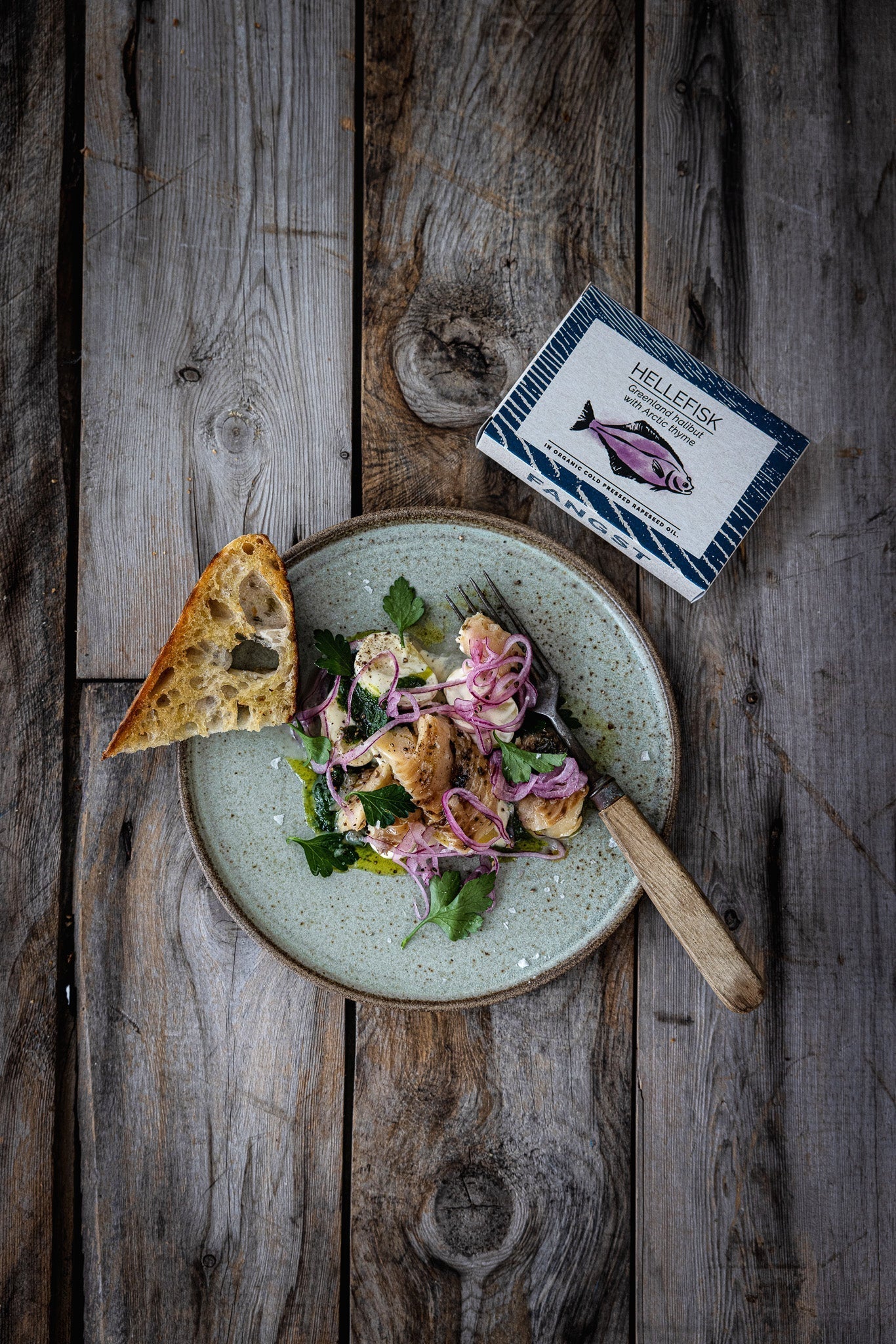 Greenland halibut with potato, parsley and onion