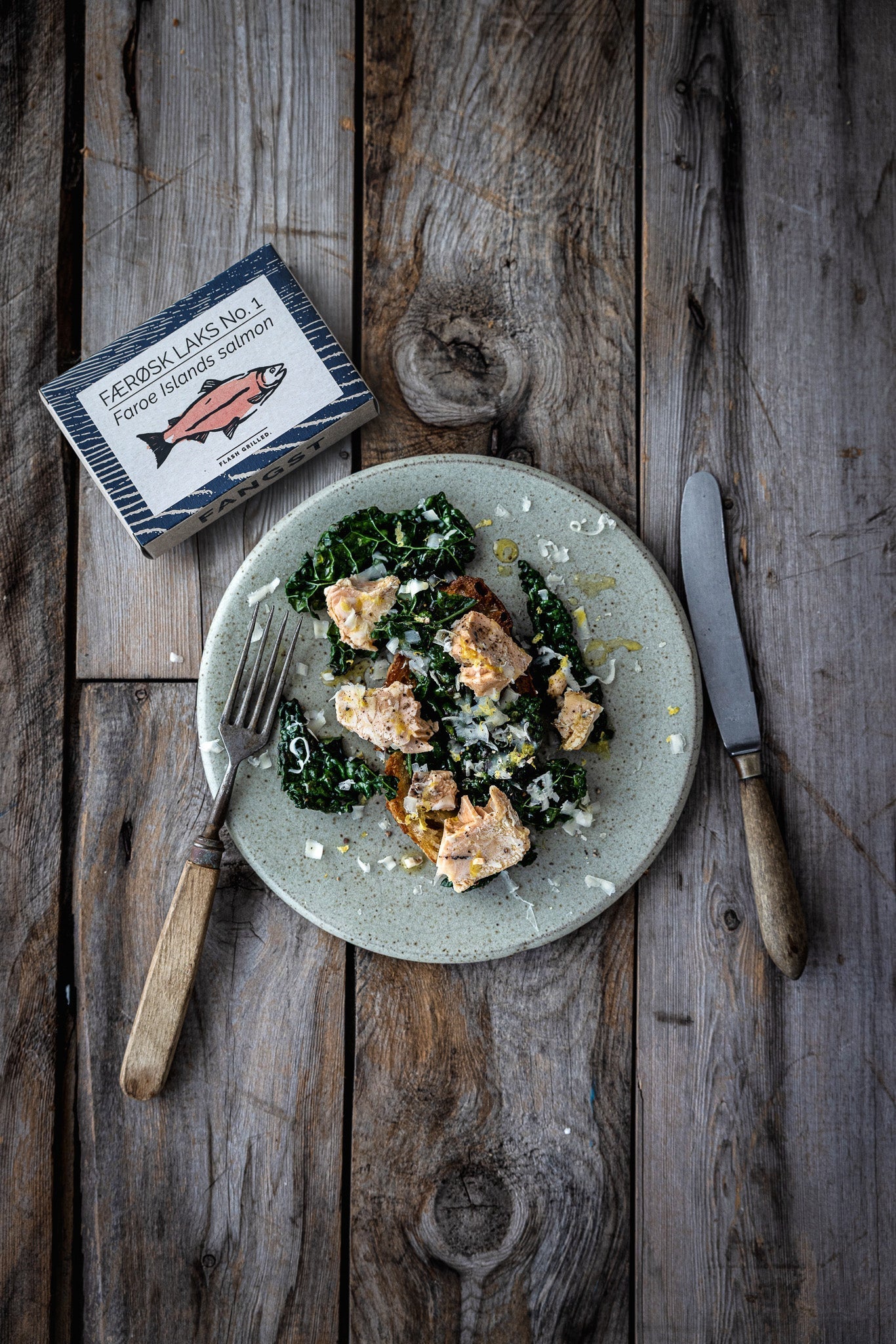 Faroe Islands salmon with kale and grated cheese