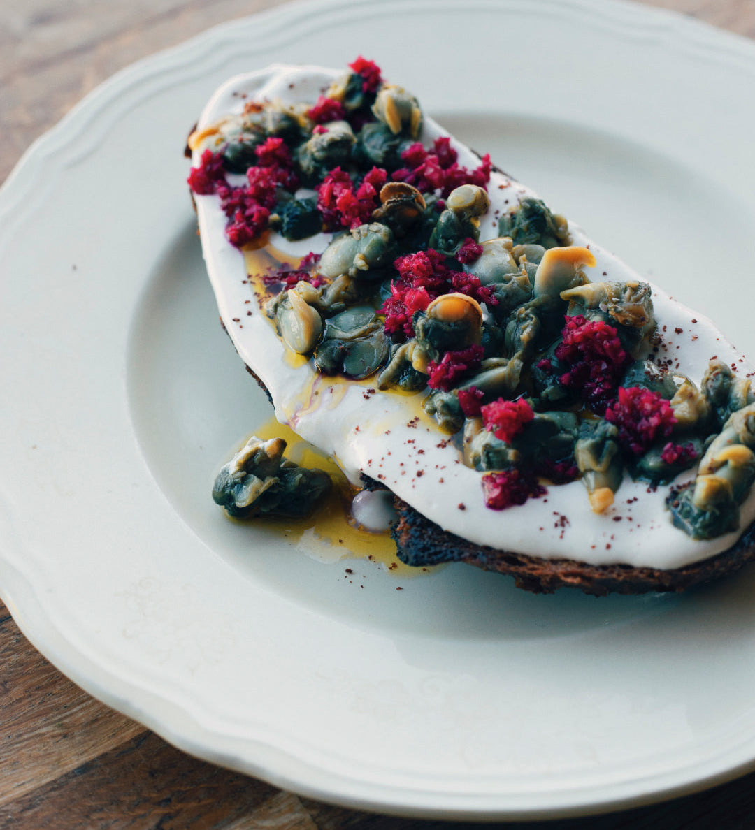 Noosh toast with cockles, lemon tahini & pickled beetroot